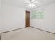 Simple bedroom with neutral carpet and a window at 6898 W Nova Dr, Littleton, CO 80128