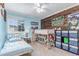 Bright bedroom with playful decor and a loft bed at 3186 W Indian Summer Ln, Castle Rock, CO 80109