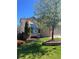 Charming two-story home with a well-manicured lawn and appealing landscaping at 3186 W Indian Summer Ln, Castle Rock, CO 80109