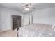 Spacious bedroom with ceiling fan, neutral carpet and fresh paint at 3186 W Indian Summer Ln, Castle Rock, CO 80109