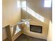 Lofted view of living room with high ceilings, large windows, and a ceiling fan at 407 Ivory Cir, Aurora, CO 80011
