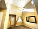 Bright living room with high ceilings, neutral paint, and large windows at 407 Ivory Cir, Aurora, CO 80011