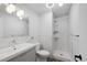 Modern bathroom features tiled shower, grey vanity, and updated fixtures at 2800 Kalmia Ave # C101, Boulder, CO 80301