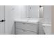 Elegant bathroom featuring updated vanity, fixtures, and a large framed mirror at 2800 Kalmia Ave # C101, Boulder, CO 80301