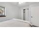 Bright bedroom with closet and window looking out onto greenery at 2800 Kalmia Ave # C101, Boulder, CO 80301
