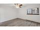 Spacious bedroom with ceiling fan and a window with a view at 2800 Kalmia Ave # C101, Boulder, CO 80301