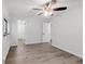 Airy bedroom with ceiling fan, fresh floors, and view to the hallway and closet at 2800 Kalmia Ave # C101, Boulder, CO 80301