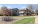 Apartment building with brick facade, balcony, and well-maintained lawn at 2800 Kalmia Ave # C101, Boulder, CO 80301