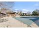 Community pool with lounge chairs and covered for the off season at 2800 Kalmia Ave # C101, Boulder, CO 80301