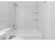 Bright shower with a white subway tile surround and a bathtub at 2800 Kalmia Ave # C101, Boulder, CO 80301