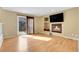 Living room with fireplace, television and sliding doors at 3575 S Waco St, Aurora, CO 80013