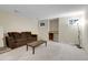 Basement living room features a wet bar and mini fridge at 3575 S Waco St, Aurora, CO 80013