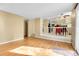Living room with hardwood floors and connecting kitchen at 3575 S Waco St, Aurora, CO 80013