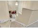 Bright foyer and staircase with a stylish lantern pendant at 3575 S Waco St, Aurora, CO 80013