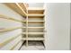 Unfinished storage shelves in the basement at 3575 S Waco St, Aurora, CO 80013