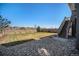 Spacious backyard with green grass and mature landscaping, ideal for outdoor gatherings and relaxation at 7121 W Asbury Pl, Lakewood, CO 80227
