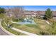 Community playground with modern equipment and green surroundings, perfect for Gathering fun at 7121 W Asbury Pl, Lakewood, CO 80227