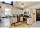 Efficient kitchen design featuring stainless steel appliances, granite countertops, and ample cabinet space at 8680 Apache Plume Dr, Parker, CO 80134