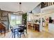 Well-appointed kitchen showcases granite countertops, white cabinets, and bar-style seating at 8680 Apache Plume Dr, Parker, CO 80134