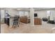 Expansive finished basement with cozy seating, a bar area, and a dedicated workout space, ideal for versatile living at 5434 S Rome St, Aurora, CO 80015