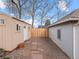 View of shed and privacy fence in backyard with rock and stone ground cover at 6795 W 29Th Ave, Wheat Ridge, CO 80214