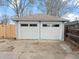 Two car detached garage with two white doors at 6795 W 29Th Ave, Wheat Ridge, CO 80214
