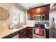 Well-equipped kitchen with granite countertops, stainless steel appliances and ample cabinet space at 2253 S Fox St, Denver, CO 80223