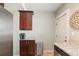 Functional kitchen space with stainless steel appliances, granite countertops and ample cabinet space at 2253 S Fox St, Denver, CO 80223