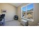 Bonus room with scenic views and a comfortable chair and ottoman set at 114 Vale St, Palmer Lake, CO 80133