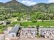 Townhomes offer scenic mountain views, lush greenery, and a serene residential setting, perfectly situated in a desirable location at 114 Vale St, Palmer Lake, CO 80133