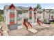 Attractive townhomes with private entrances, garages, and manicured front yards at 114 Vale St, Palmer Lake, CO 80133