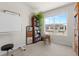 Bright office space with a large window and ample room for a work area at 132 Ambrose St, Erie, CO 80516