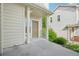 Front entrance featuring a covered porch, siding, and landscaping at 12921 Grant Cir # B, Thornton, CO 80241