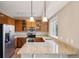 Updated kitchen with stainless steel appliances and granite countertops at 12921 Grant Cir # B, Thornton, CO 80241