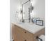 Elegant bathroom featuring a sleek vanity with modern fixtures and stylish decor at 2838 Tennyson St, Denver, CO 80212