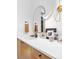 Modern bathroom featuring a white countertop, stylish mirror, and decorative accents at 2838 Tennyson St, Denver, CO 80212