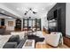Stylish living room with a fireplace, comfortable seating, and access to the backyard at 2838 Tennyson St, Denver, CO 80212