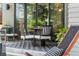 Covered patio has comfortable seating for entertaining at 2838 Tennyson St, Denver, CO 80212