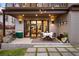 Outdoor patio with dining set, grill, and seamless transition to the interior living space at 2838 Tennyson St, Denver, CO 80212