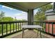 Balcony with table and wood decking and a view at 2727 Folsom St # 303, Boulder, CO 80304