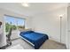 Bedroom featuring carpet, large window with a view, and a floor lamp at 2727 Folsom St # 303, Boulder, CO 80304