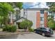 Attractive condo building with a well-maintained exterior and parking area at 2727 Folsom St # 303, Boulder, CO 80304