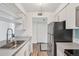 Efficient kitchen layout with stainless steel appliances and ample storage space at 2727 Folsom St # 303, Boulder, CO 80304