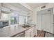 Open kitchen leading to the living room and balcony, creating a seamless living space at 2727 Folsom St # 303, Boulder, CO 80304