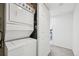 Laundry closet with stacked washer and dryer units at 2727 Folsom St # 303, Boulder, CO 80304