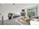 Bright living room features a fireplace, modern decor, and sliding doors to a balcony at 2727 Folsom St # 303, Boulder, CO 80304