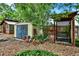 Backyard featuring storage sheds, and a covered bench to enjoy the green space of this well kept property at 13496 Alcott Way, Broomfield, CO 80020