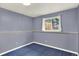 Inviting bedroom with soft natural light and plush blue carpet flooring at 13496 Alcott Way, Broomfield, CO 80020