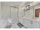 Luxurious bathroom with a glass-enclosed shower, double vanity, and elegant fixtures for a spa-like experience at 55 Blue Flag Dr, Breckenridge, CO 80424