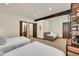Bright bedroom features two twin beds, a seating area and an interesting bookcase at 55 Blue Flag Dr, Breckenridge, CO 80424